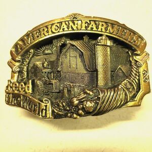 Vintage "AMERICAN FARMERS FEED THE WORLD" Brass Belt Buckle 1984 (Pre-Owned)